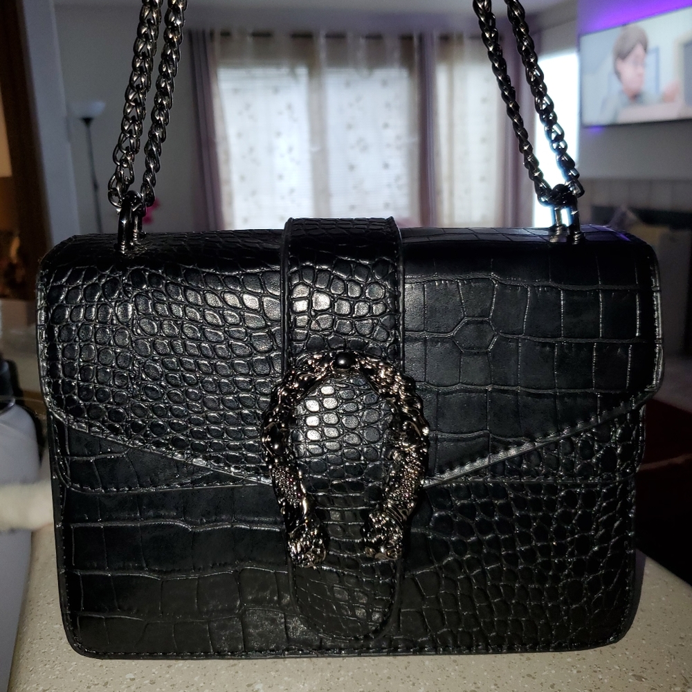 Snake print flip chain crossbody bag